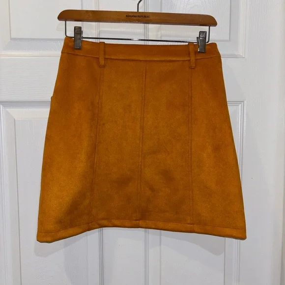 Philosophy faux suede mustard yellow mini skirt
SZ2 - Picture 2 of 7